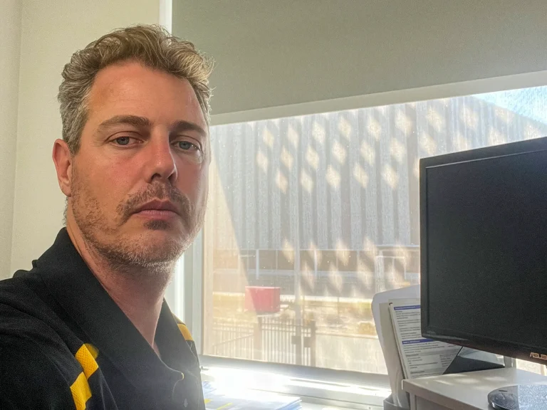 Tree services manager at desk